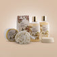 lovery handmade body care, handmade body care, Honey & Almond Body Care Set, Honey & Almond bath product close-up, Luxurious Honey & Almond spa essentials, eco-friendly bath set display, Shea & Vitamin E, spa items, Natural ingredients, all skin types, bath products, Paraben-free, Honey & Almond collection